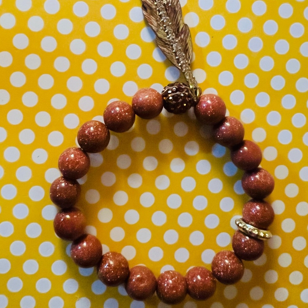 62. Brown Beaded Bracelet with Gold Accents
“Goldstone”
